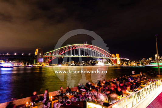 The Sydney Harbour Bridge coloured red during Vivid Sydney Light, Music and Ideas Festival. Sydney, New South Wales, Australia.