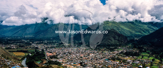 A town at the base of the Andes mountains in a lush valley. Urubamba, Peru.