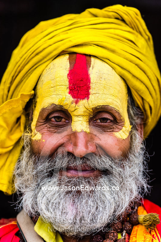 A yellow-dyed face paint of a sadhu, an ascetic Hindu holy man. Kathmandu, Pashupatinath Temple, Nepal