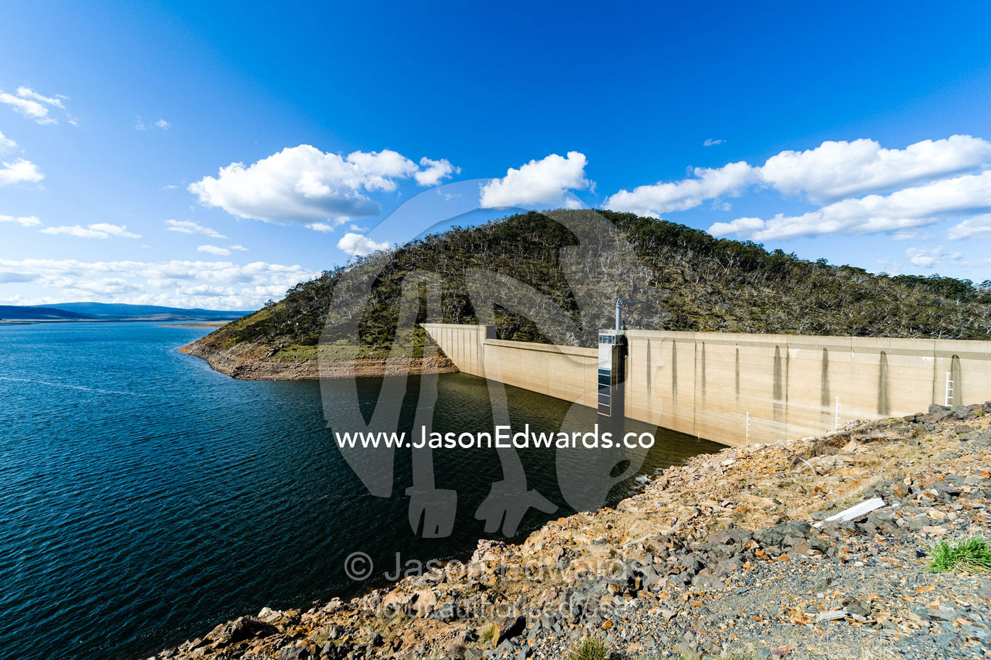 A manmade dam wall holding water for towns and cities. Kosciuszko National Park, Tantangara Dam, New South Wales, Australia