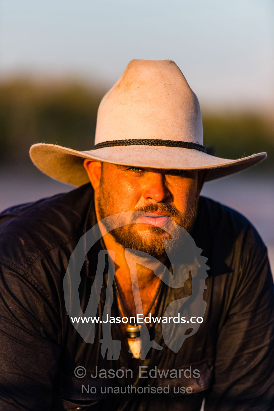 A portrait of a Saltwater Crocodile trapper wearing an Akubra hat on a outback cattle station. Timber Creek, Victoria River Dis, Bullo River Station, Northern Territory, Australia