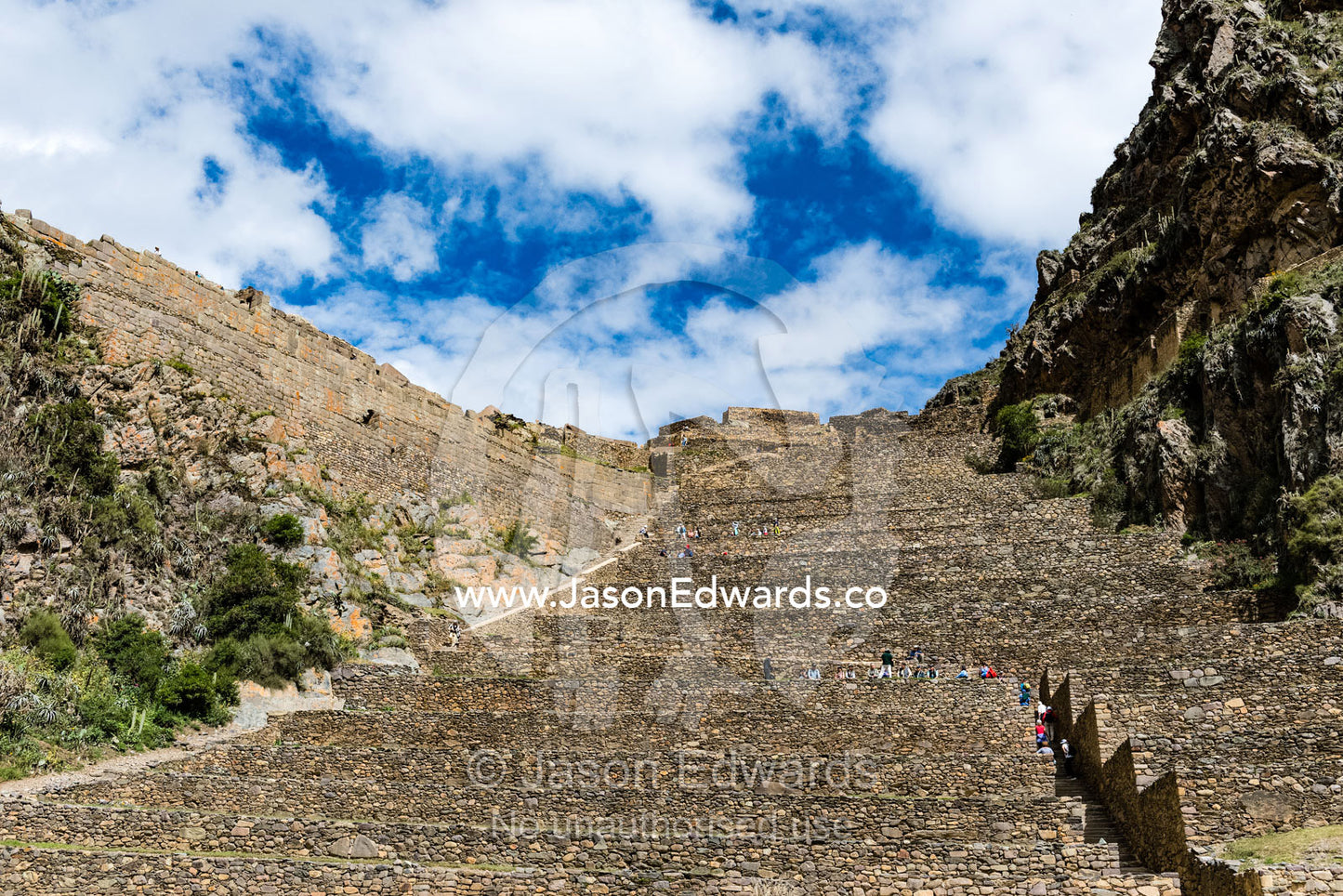 Enormous tiered stone terraces leading to the Inca Temple of the Sun ruins. Sacred Valley, Ollantaytambo, Urubamba, Peru