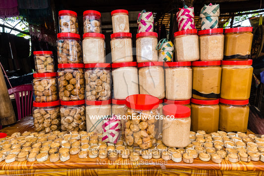 A stand selling palm sugar, jaggery, candy in a village. Phnom Dei, Banteay Srei, Banteay Srey, Cambodia