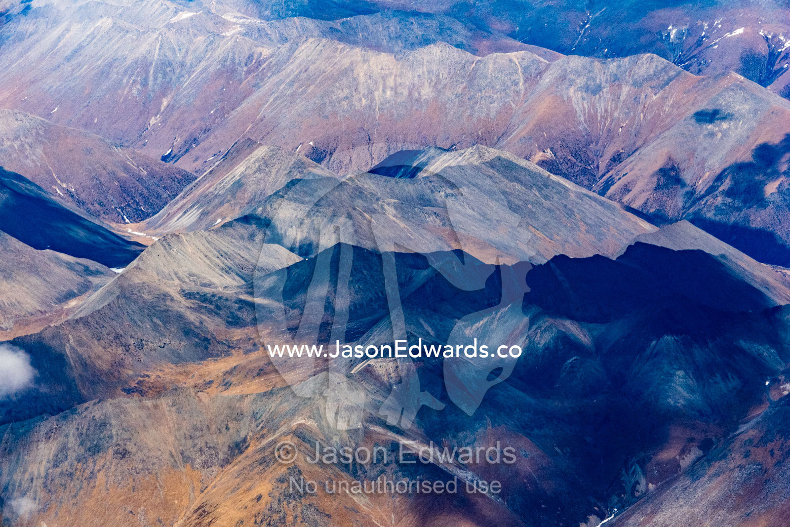 Barren and eroded foothills of the Himalaya Mountains during the brief summer. Himalaya Mountains, Tibet