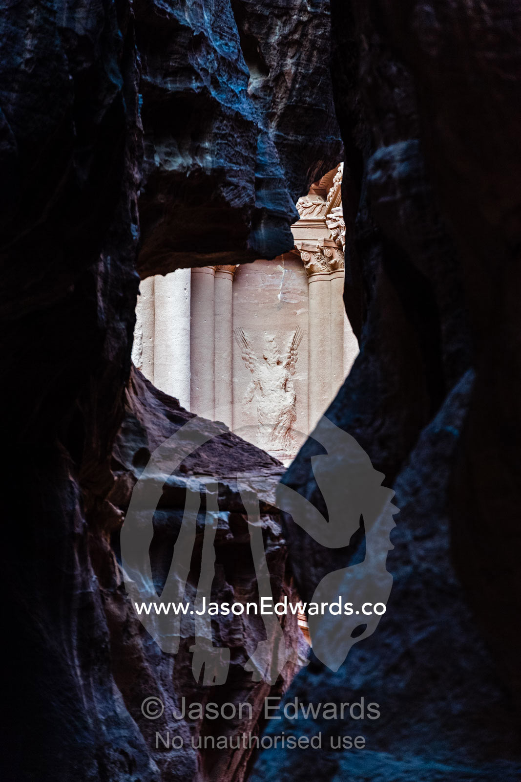 The Siq sandstone gorge is the main entrance to the ancient Nabatean city of Petra and the Treasury. Petra, The Lost City of Petra, Jordan