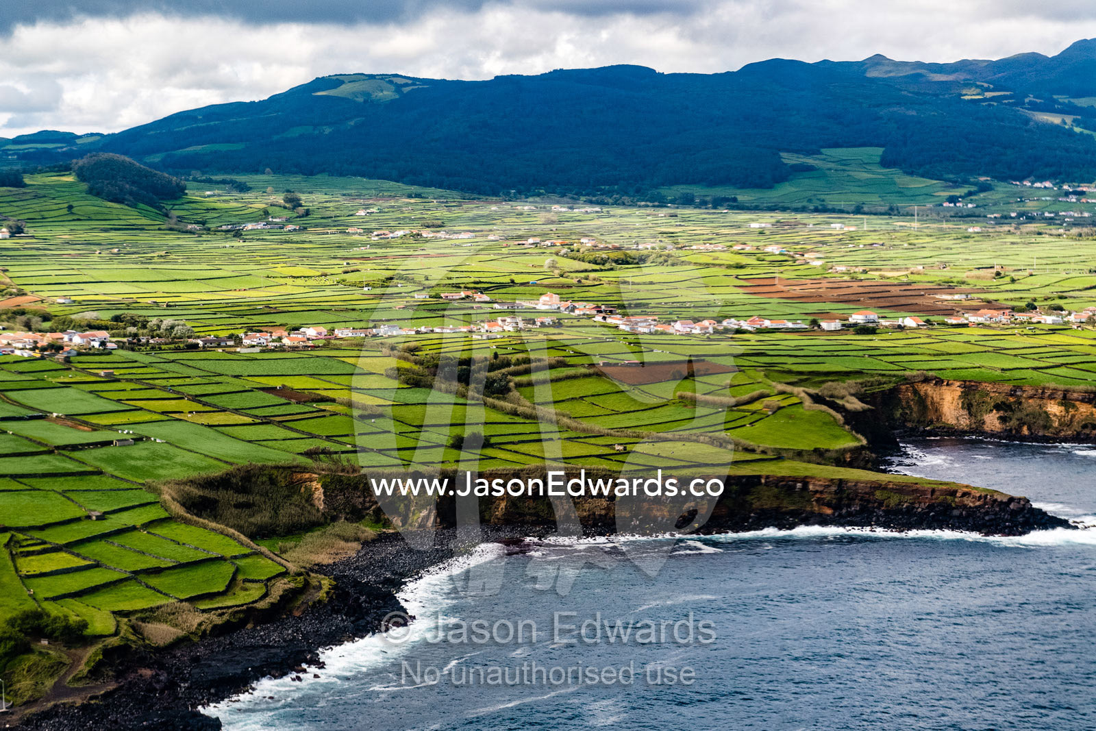 Atone-fenced pasturelands and farm fields. Municipality of Praia da Vitoria, Terceira Island, Autonomus Region of The Azores, Portugal