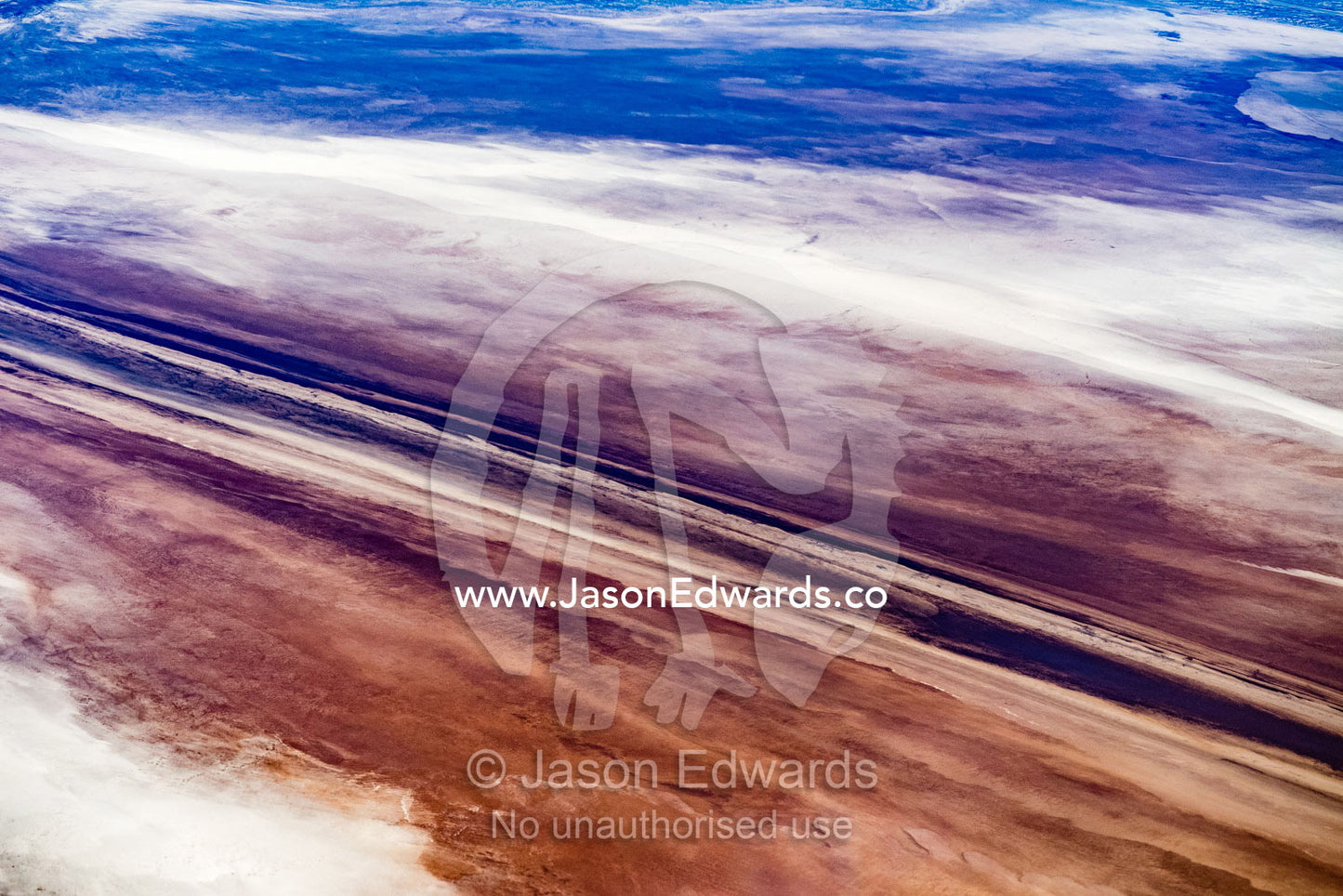 An aerial view of vast sand patterns in the desert caused by evaporation and erosion. Northern Territory, Australia
