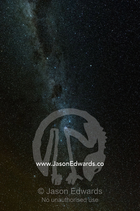 The Milky Way Galaxy and stars fill the night sky above the desert. Namatjira, Ipolera Out Station, Northern Territory, Australia