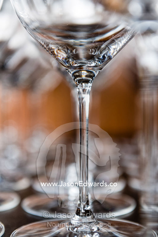 The transparent glass stems of wine glasses stored in a restaurant. Rosslyn Park, Adelaide, South Australia, Australia