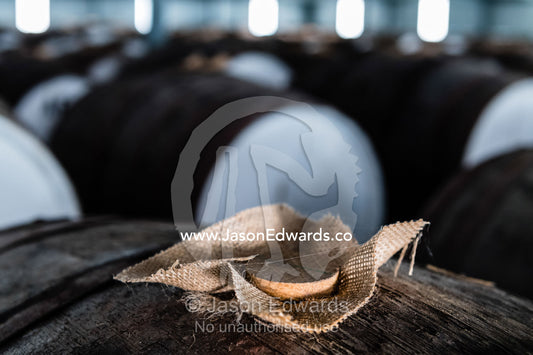 A cork and hessian cloth seal a wine barrel so that it can mature. Nuriootpa, South Australia, Australia