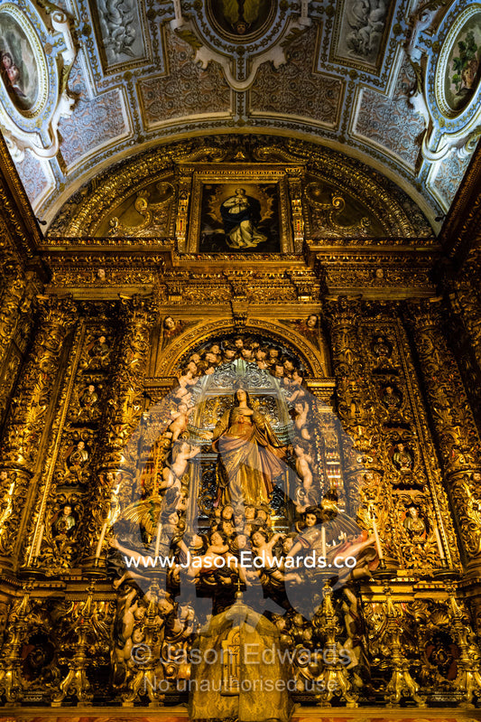 Ornate gold filigree and iconography of the Christian faith in the Roman Catholic Church Igreja de Sao Roque, Church of Saint Roch. Lisbon, Lisboa, Portugal