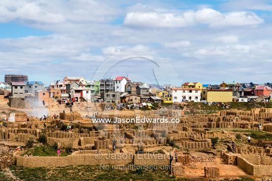 A river floodplain is converted into a handmade brick foundry for construction during the dry season. Antananarivo, Madagascar