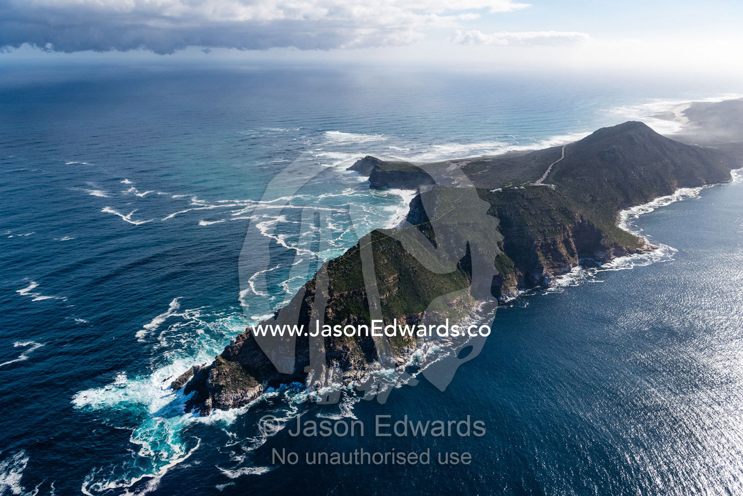 An aerial view of treacherous ocean currents circulating around the Cape of Good Hope transporting nutrient foam. Cape Point National Park, South Africa