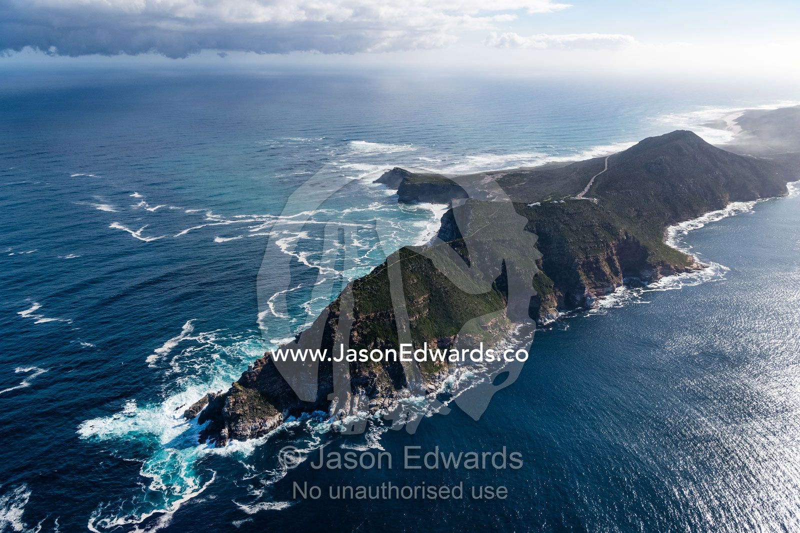 An aerial view of treacherous ocean currents circulating around the Cape of Good Hope transporting nutrient foam. Cape Point National Park, South Africa