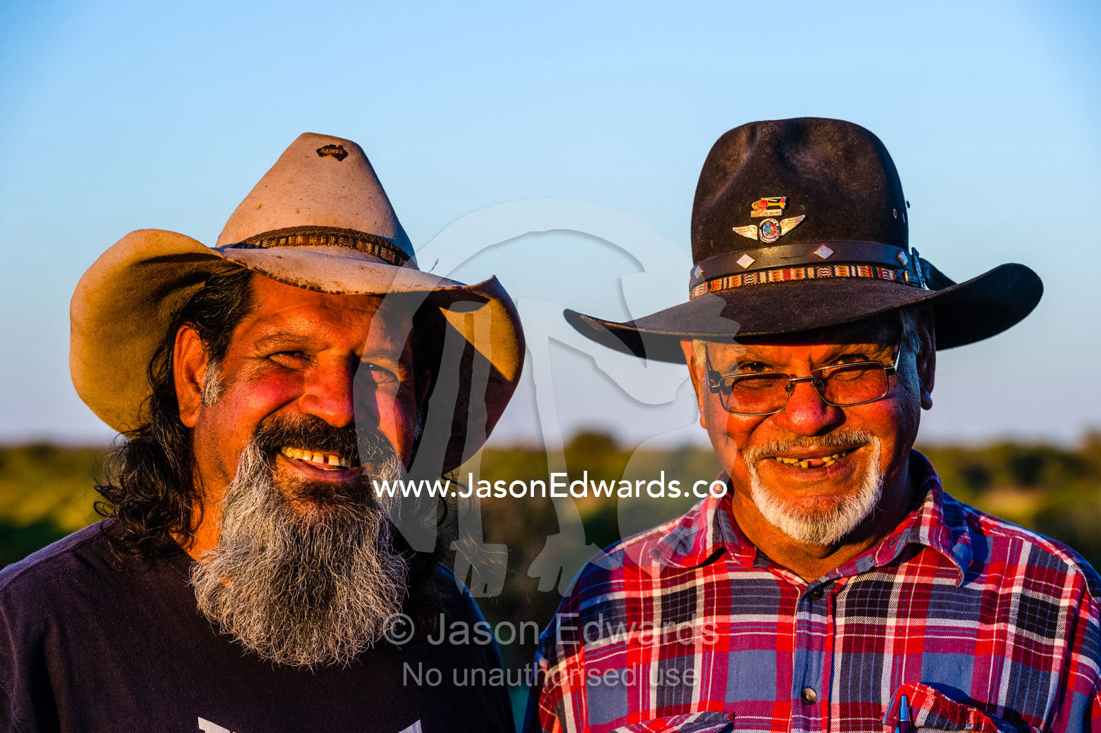An aboriginal elder and his son on an outback cattle station in the desert. Coober Pedy, Mt Willoughby Station, South Australia, Australia