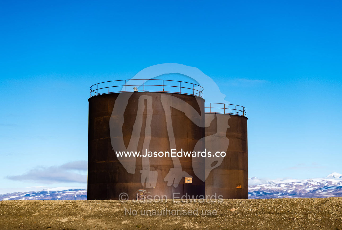 Large oil tanks on an arctic tundra airstrip to service an airport and shipping. Scoresby Sound, Constable Point, Greenland