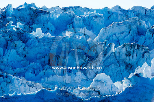 Crevasses and pressure ridges at the terminus fracture zone of a glacier. Rolinge Glacier, Rode Fjord, Scoresby Sound, Greenland