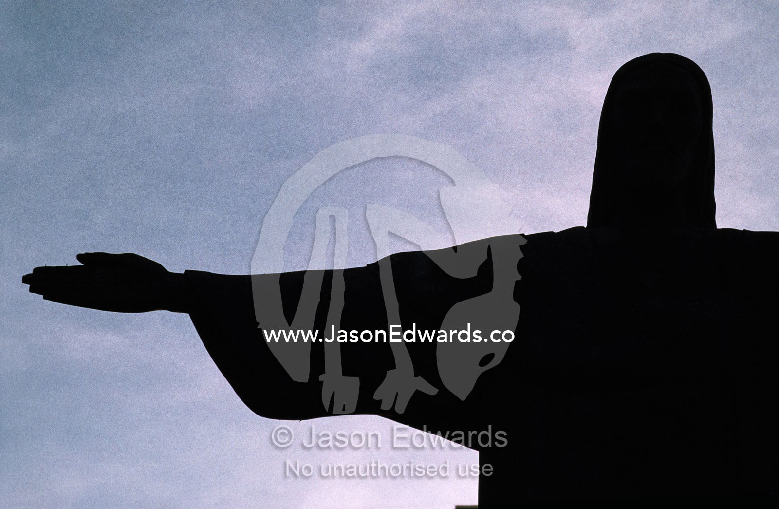 Silhouette of the Christ the Redeemer, or Christo Redentor, statue. Rio de Janiero, Brazil.
