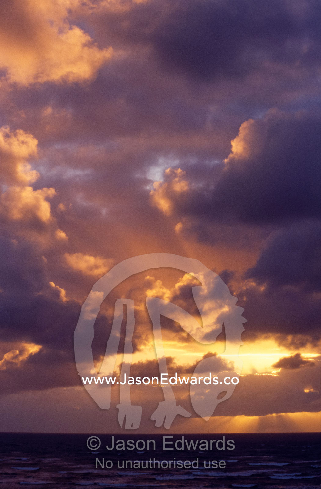Storm clouds roll in over the Indian Ocean at sunset. Coorong National Park, South Australia, Australia.