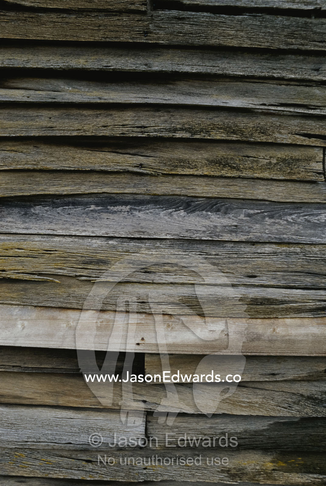 Close view of slats on an antique timber barn. Linton, Victoria, Australia.