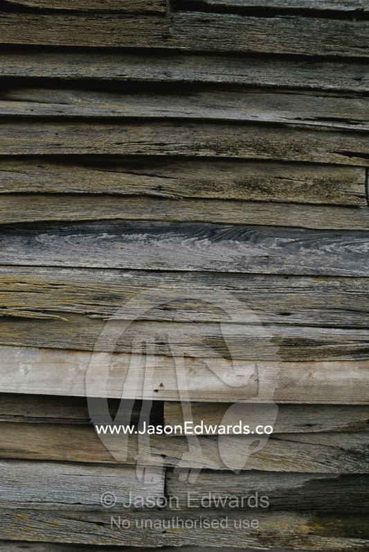 Close view of slats on an antique timber barn. Linton, Victoria, Australia.
