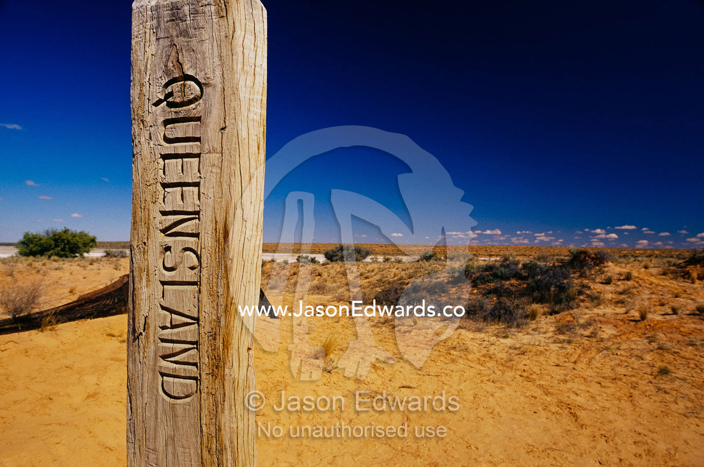 Sign post at the border of Queensland, N.T. & South Australia. Poeppel's Corner, Simpson Desert, South Australia.