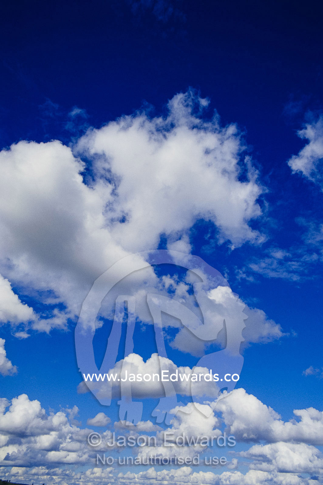 White, fluffy clouds near Carnarvon National Park. Queensland, Australia.