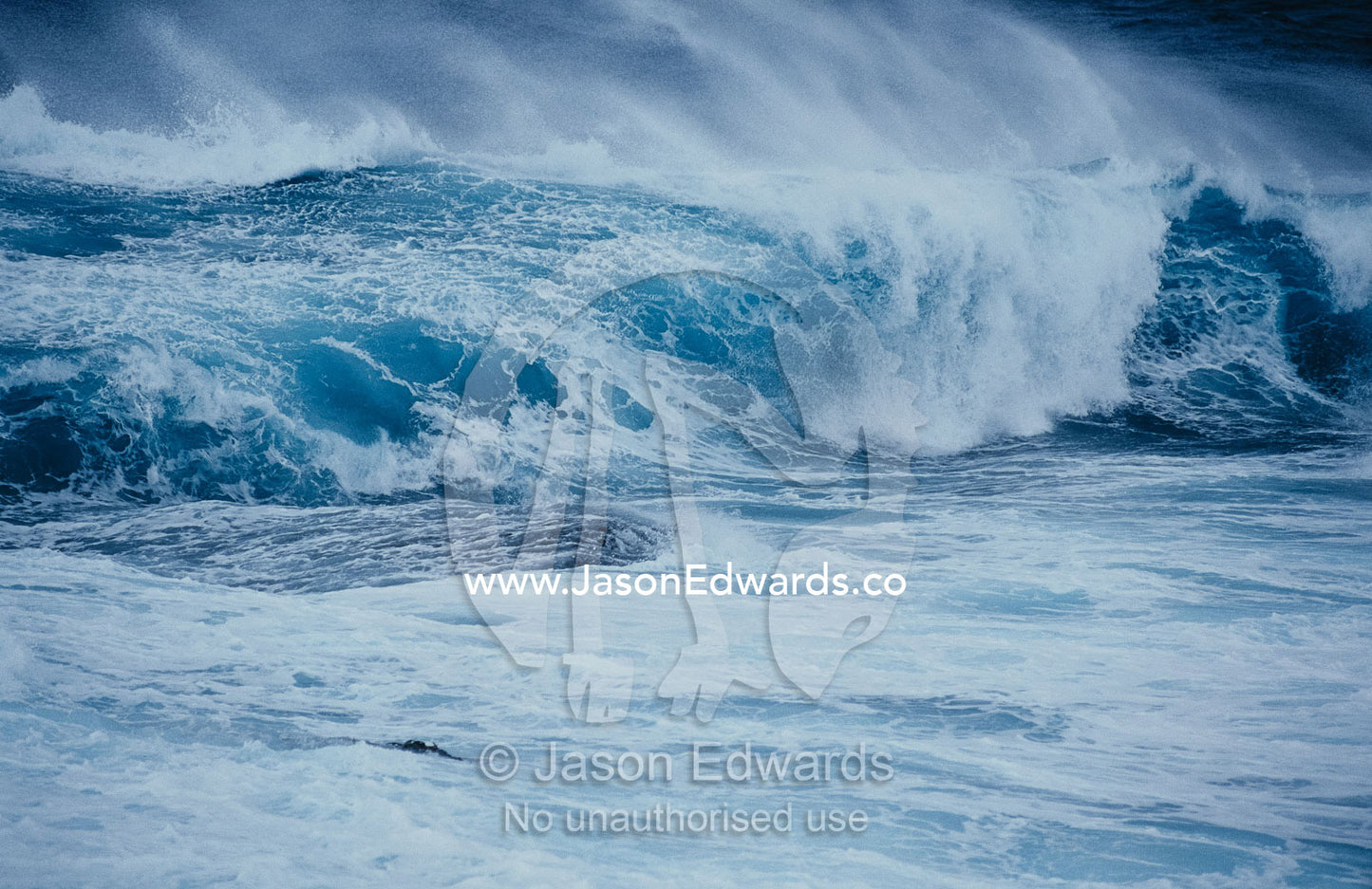Storm waves crash on rocks at Green Cape in Ben Boyd National Park. New South Wales, Australia.