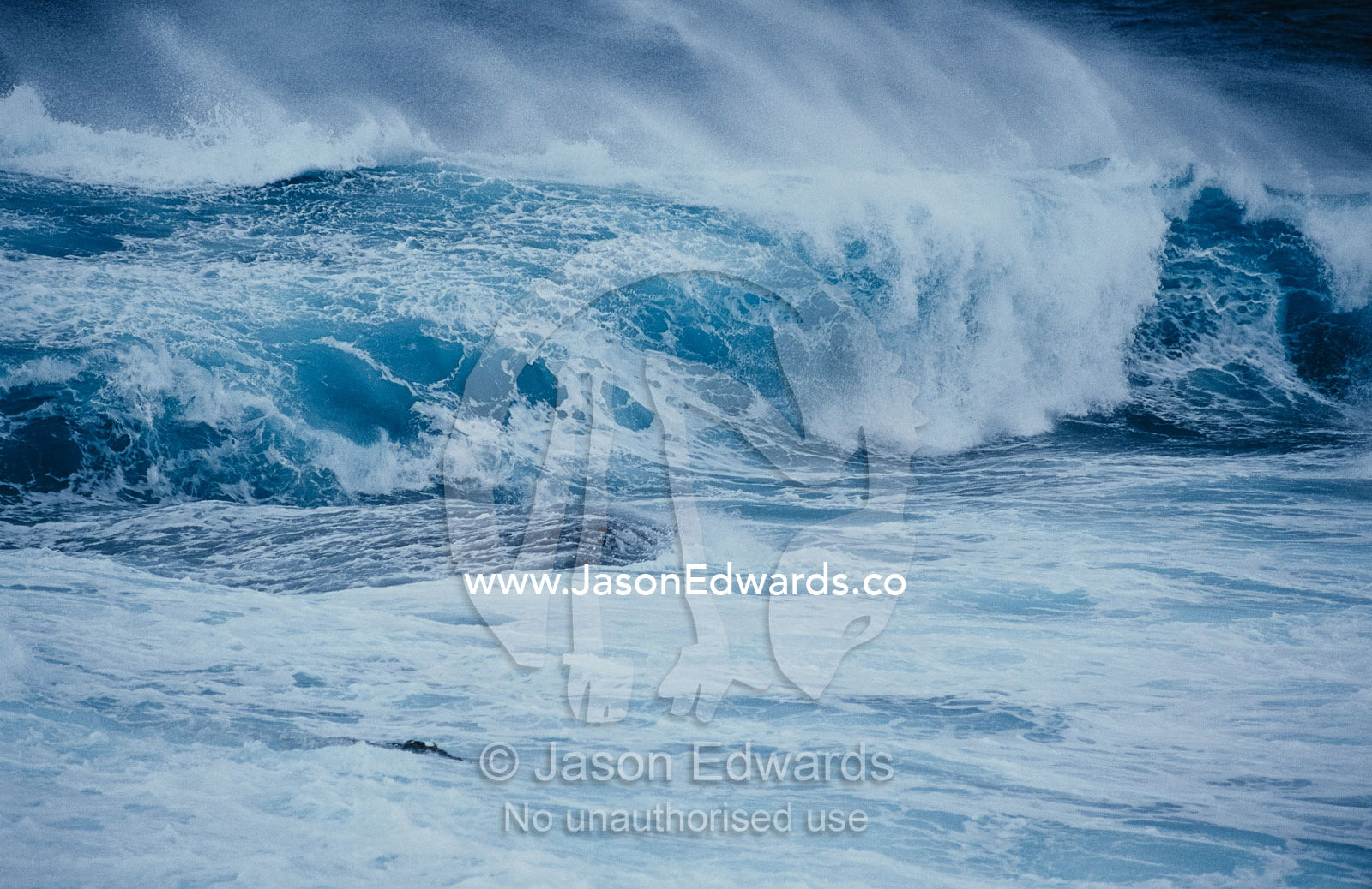 Storm waves crash on rocks at Green Cape in Ben Boyd National Park. New South Wales, Australia.