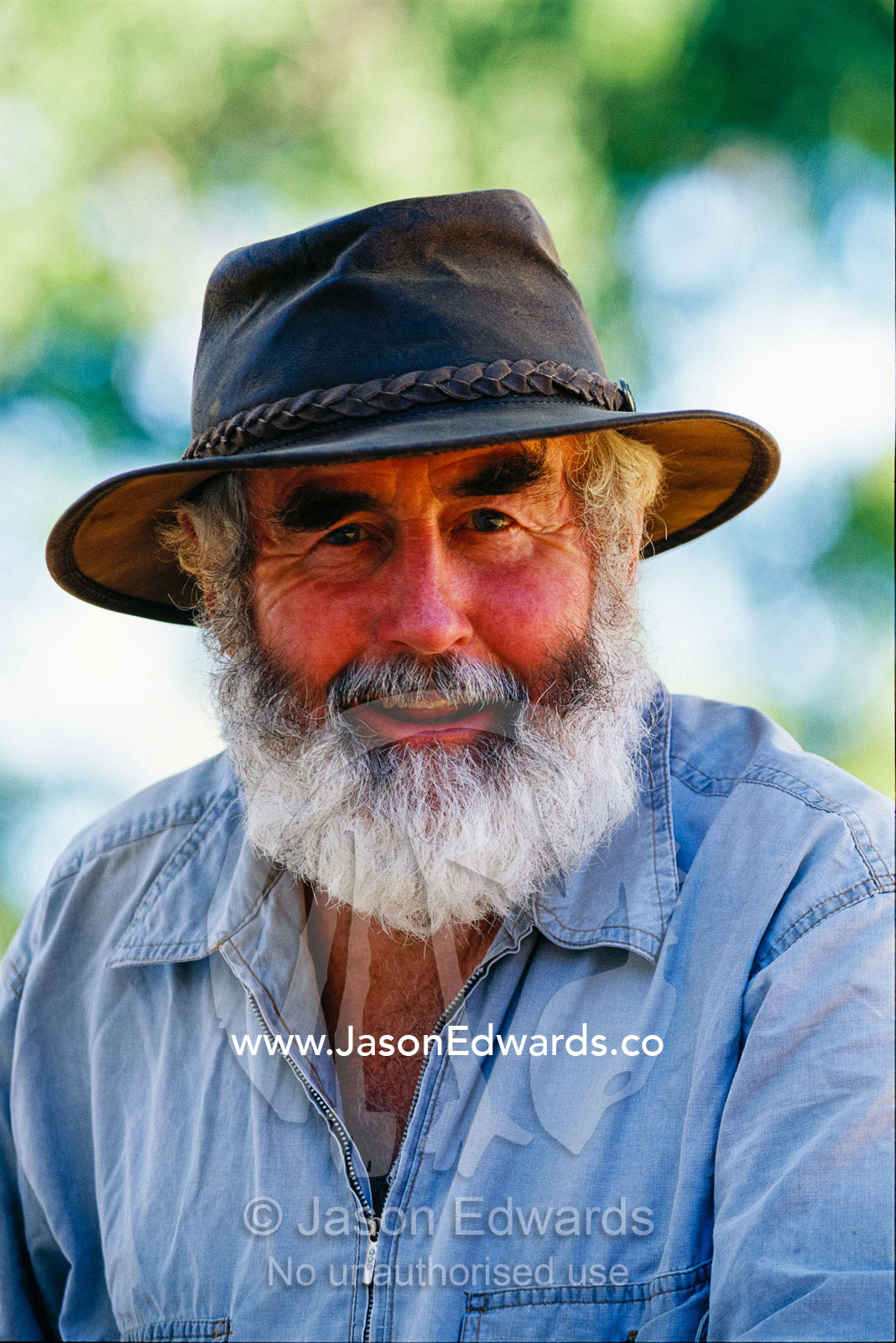 A bearded national park caretaker wearing a hat. Epping National Park, Queensland, Australia.