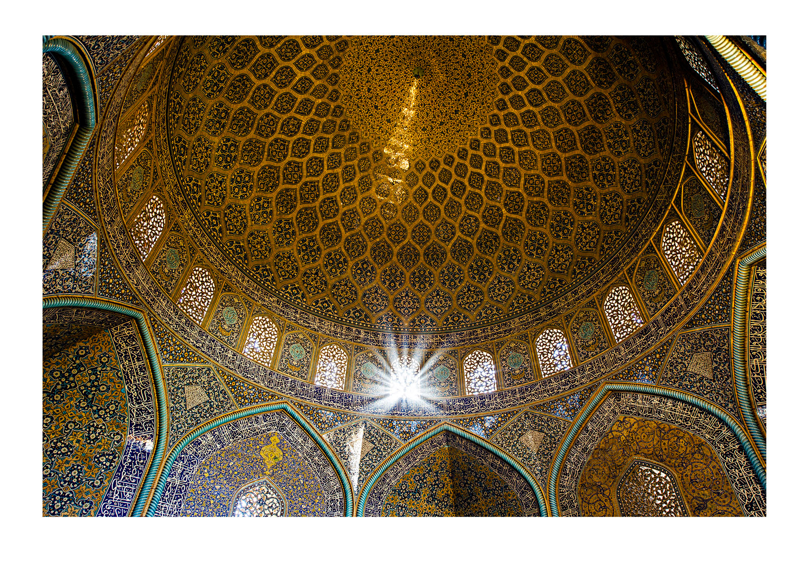 The beautiful and intricate tiled patterns on the dome of the Sheikh Lotfollah Mosque. Sheikh Lotfollah Mosque, Naqsh-e Jahan Square, Isfahan, Isfahan Province, Islamic Republic of Iran. 
