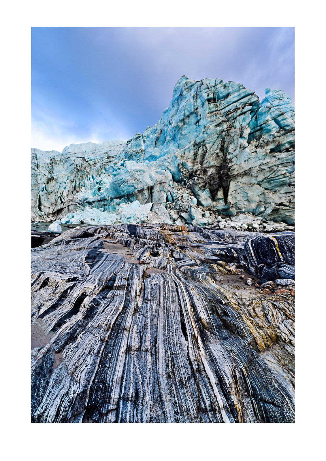 Striations and waterholes carved into the bedrock by ice erosion as a glacier receded. Russell Glacier, Greenland Ice Sheet, Qeqqata Municipality, Kangerlussuaq, Greenland.