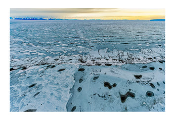 Melt pools and cracks appearing in the sea ice of the Ross Sea. North Bay, Cape Evans, Ross Sea, Ross Island, Antarctica.